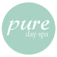A logo for pure day spa in a circle