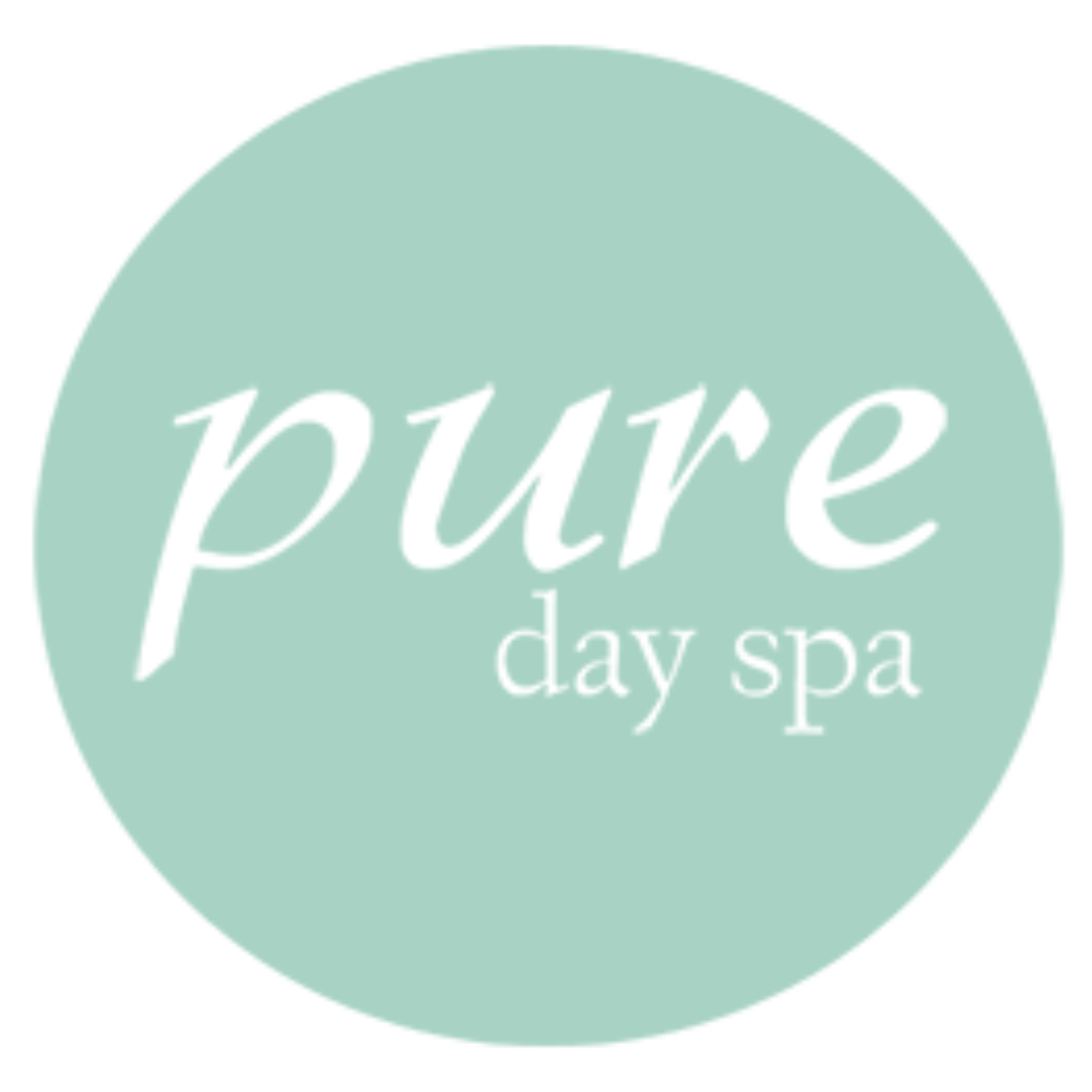 A logo for pure day spa in a circle