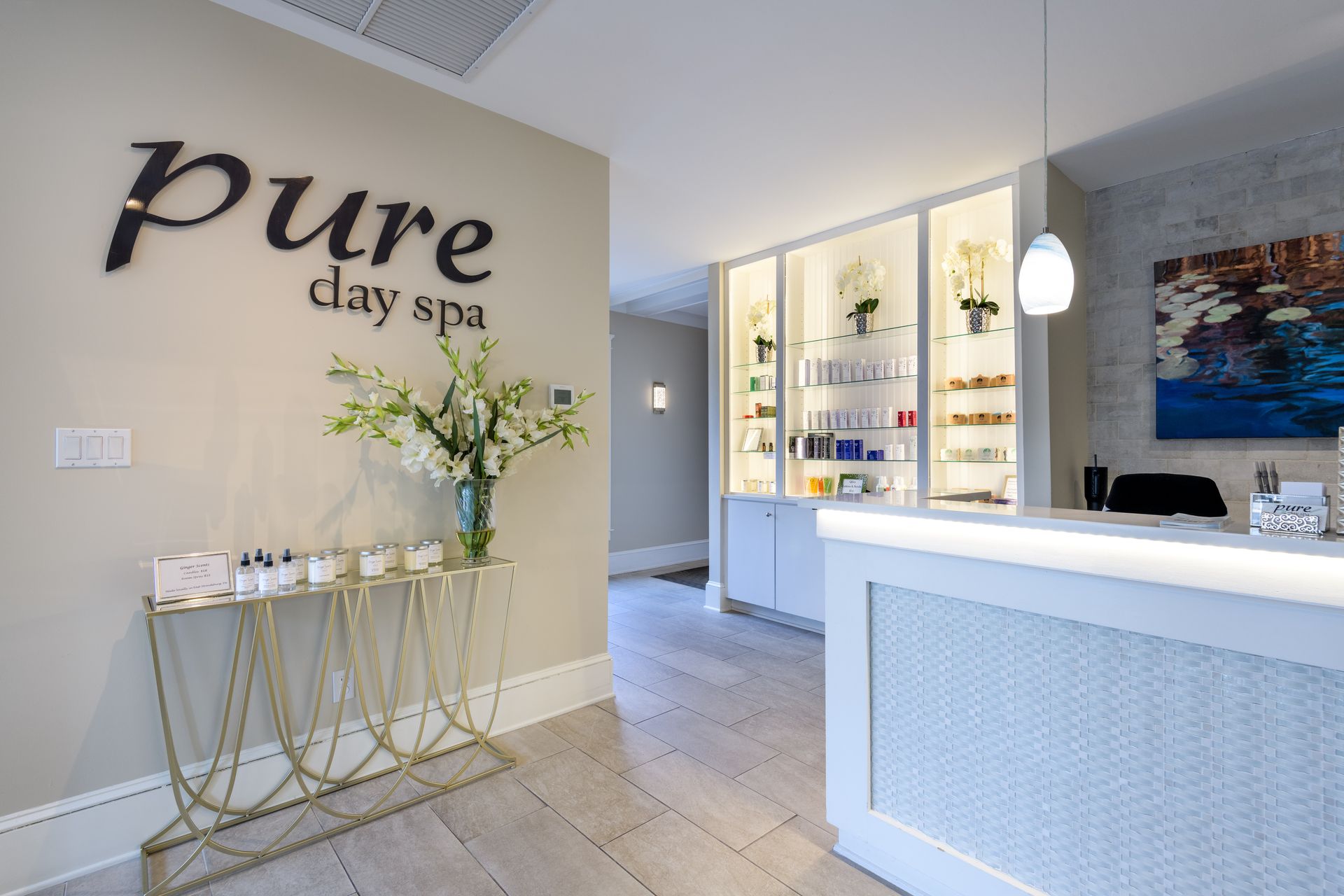 The inside of a spa with a sign on the wall that says pure day spa