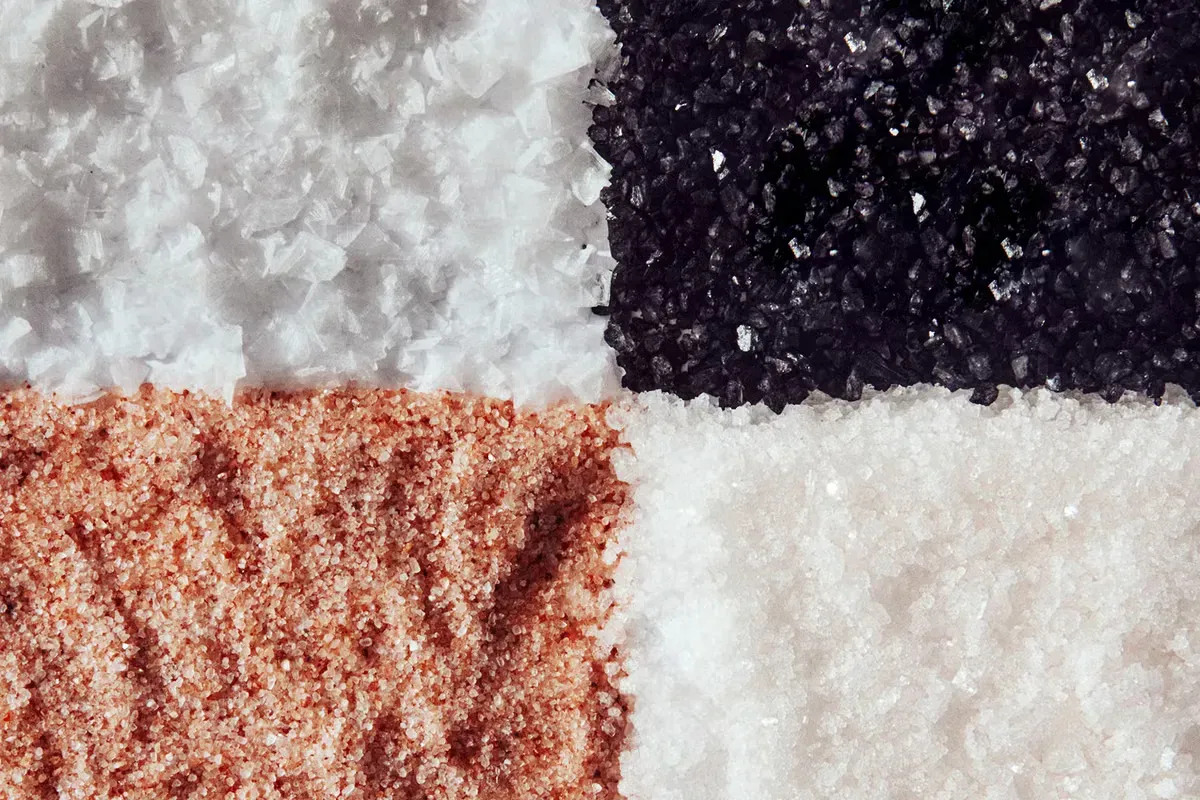 Four different types of salt are stacked on top of each other Four different types of salt are stacked on top of each other