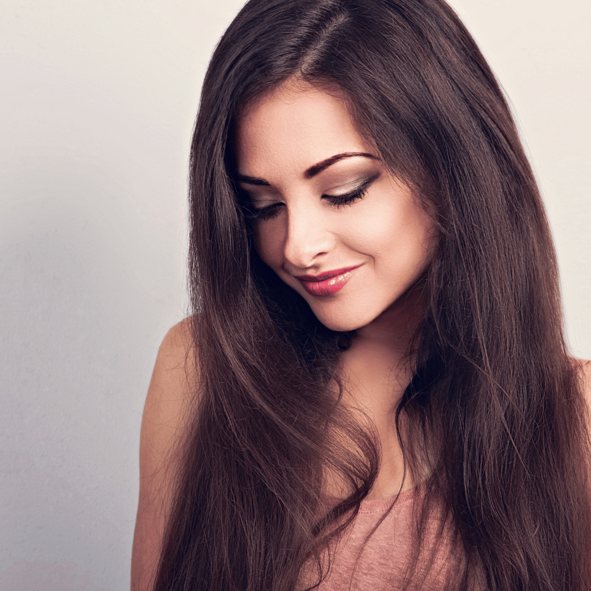 Smooth, shiny brunette hair after a keratin treatment at JUNO HAIR Gangnam