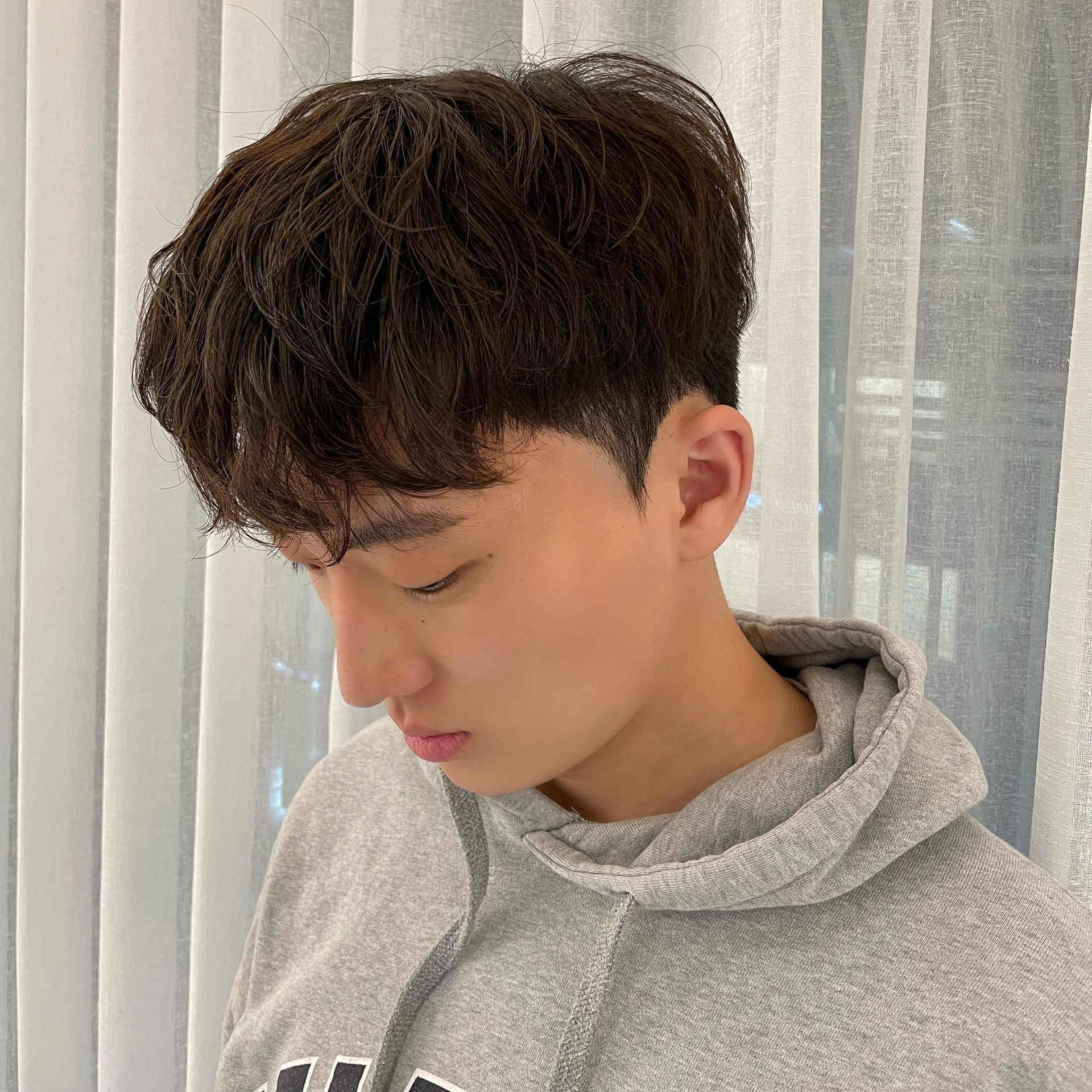 Korean men's cut with a down perm at JUNO HAIR Gangnam Station