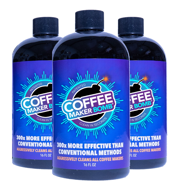 Three bottles of Coffee Maker cleaner, with a blue and black label.