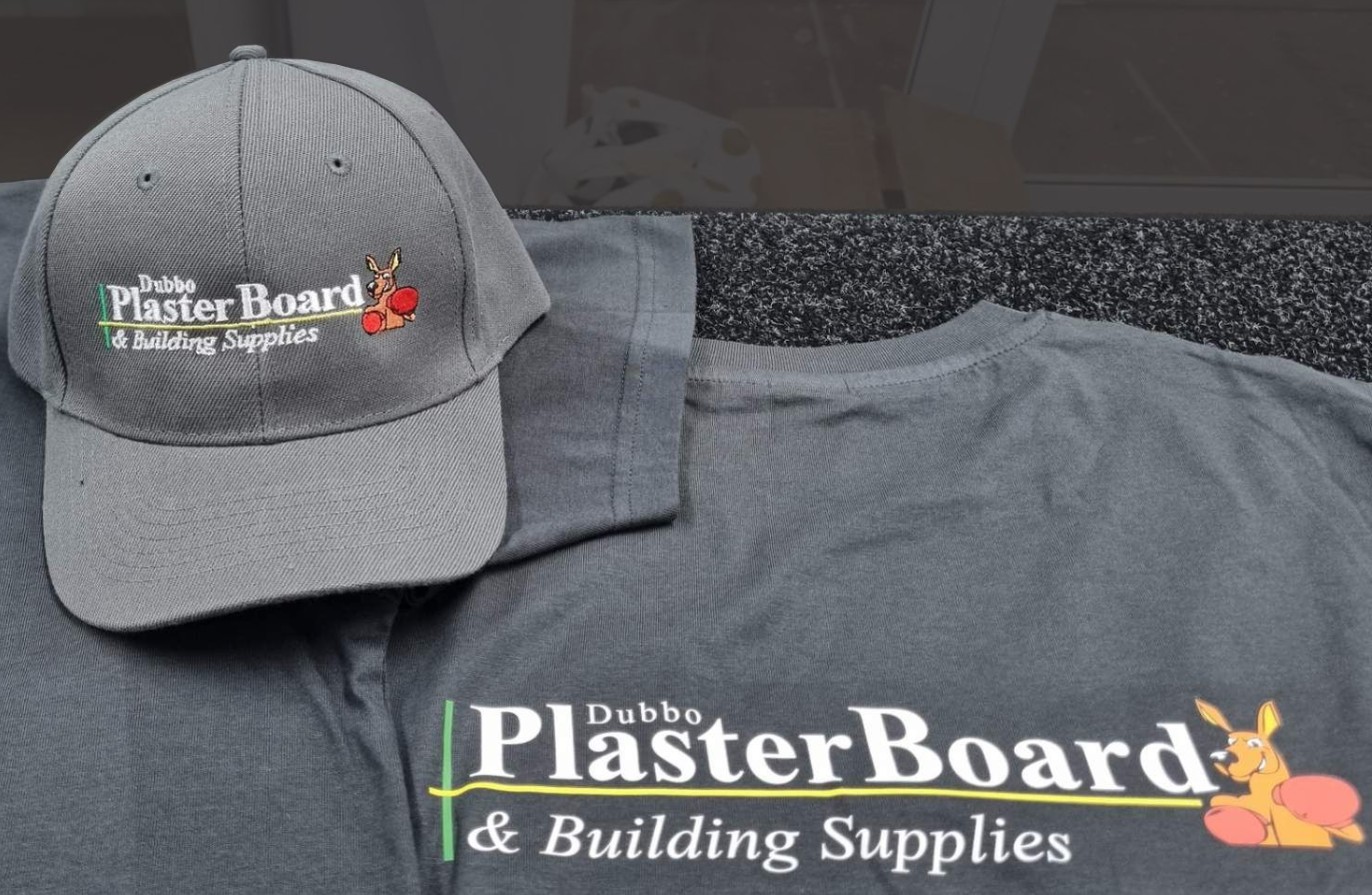 Workwear uniform of grey cap and t-shirt with custom embroidered logos and branding