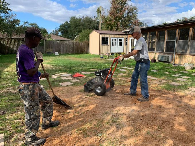 Men working on a lawn