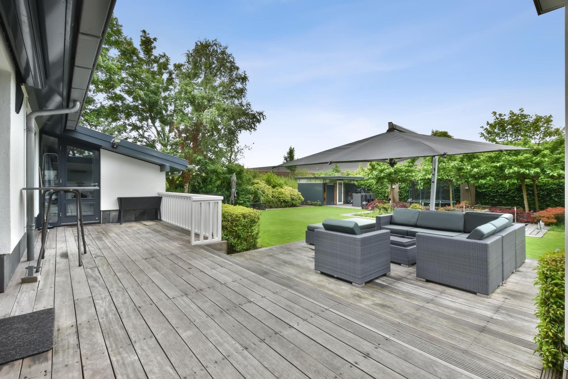 Clean Lawn with Relaxing Patio