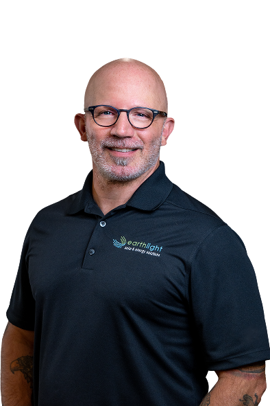 Smiling bald man with glasses wearing a black polo shirt against a white background