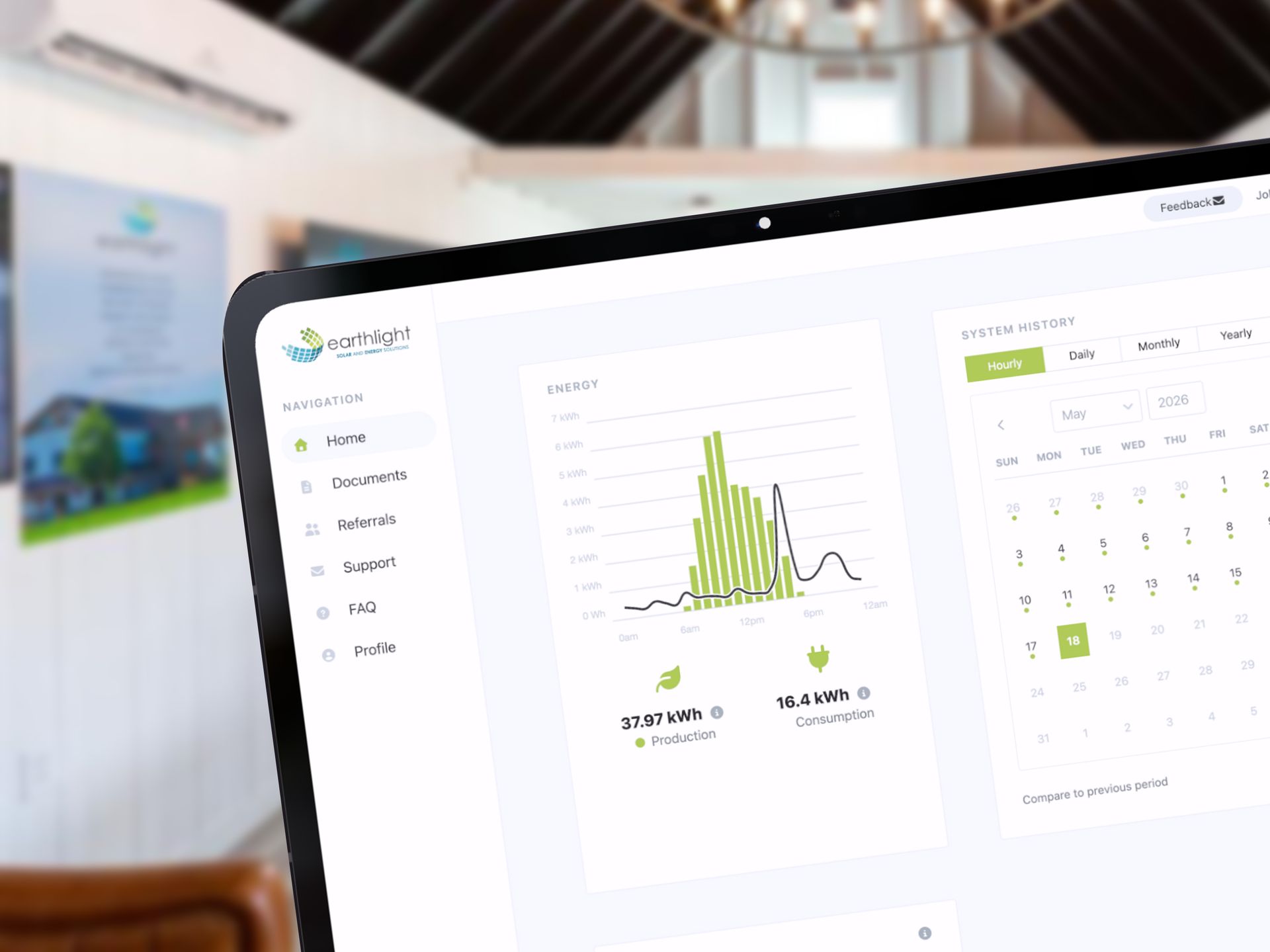 Analytics dashboard on a laptop screen with green charts and a calendar widget