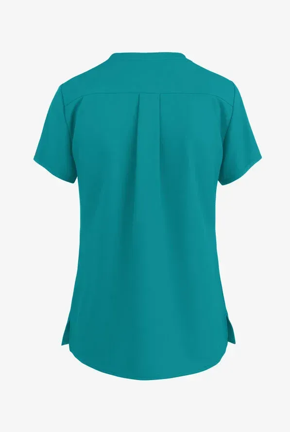 Teal scrub top with short sleeves and back pleat detail.