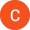 The letter c is in an orange circle on a white background.