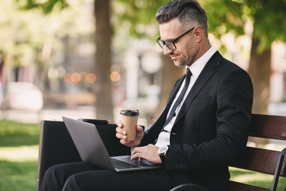 man working on laptop computer