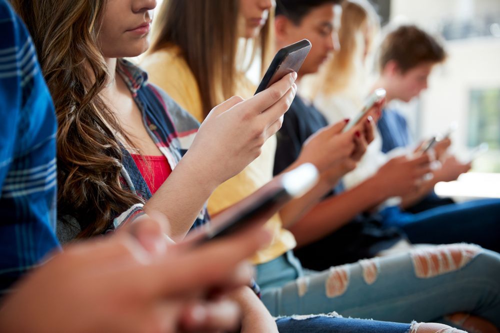young people on smart phones