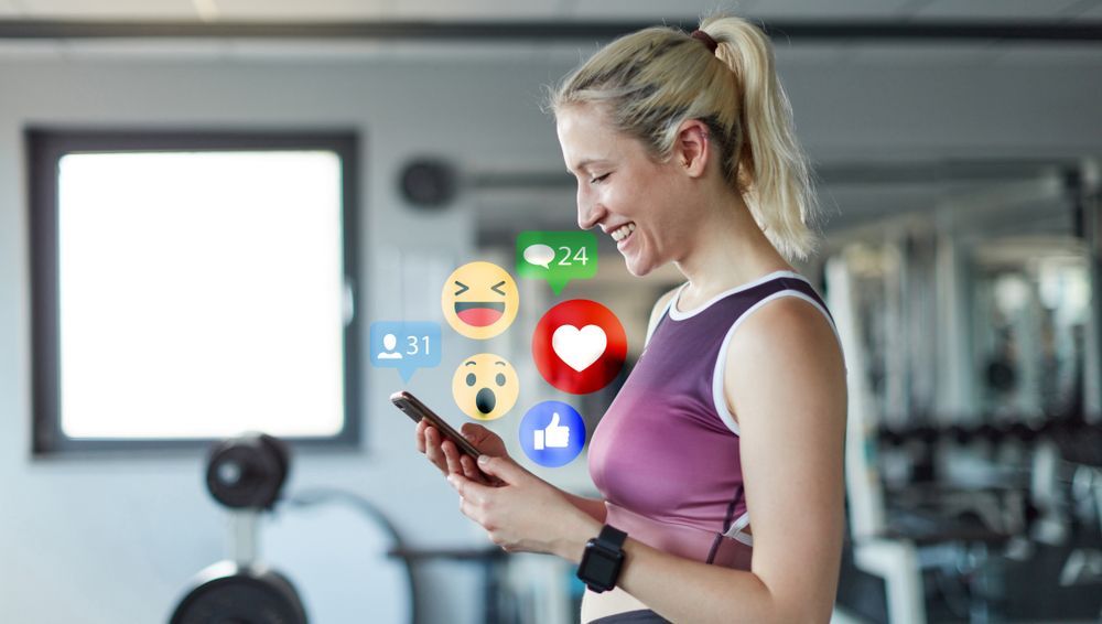 young woman looking at social media on smartphone