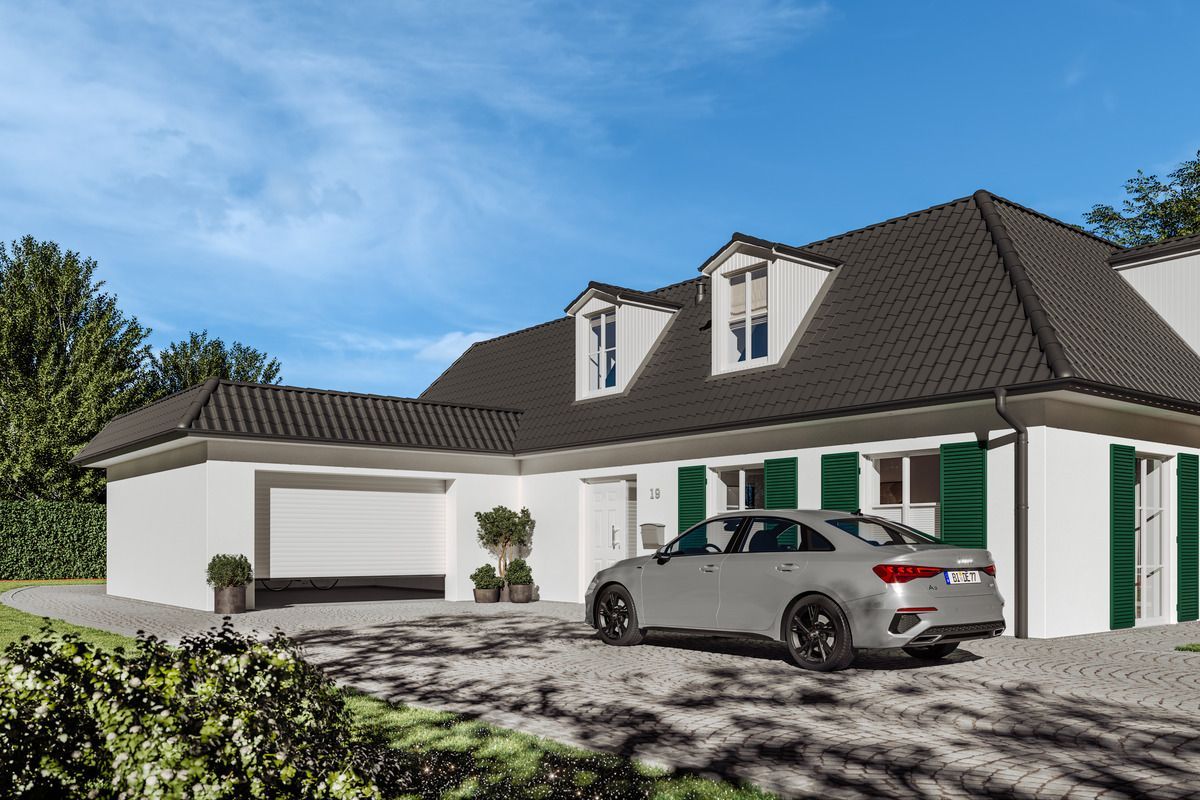 A white house with a dark roof and green shutters, a garage, and a grey car parked in the driveway under a blue sky.
