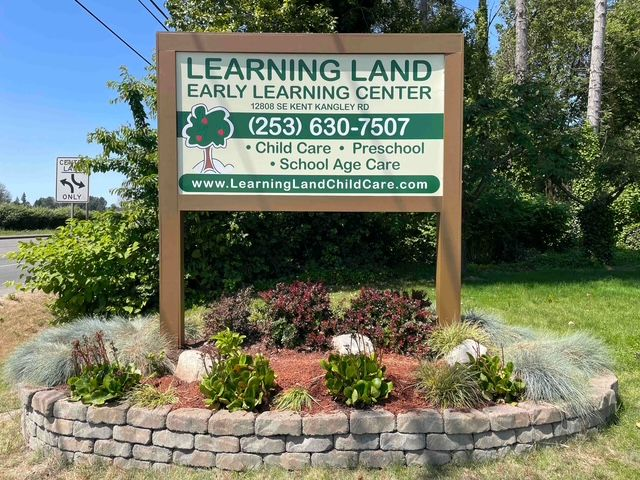 Sign for Learning Land Early Learning Center. Includes contact info and services offered.