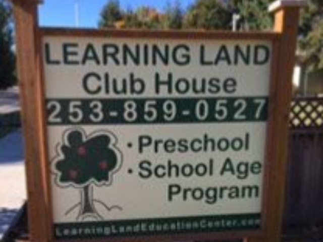 Sign for Learning Land Clubhouse: Preschool and School Age Program, with a phone number and tree graphic.