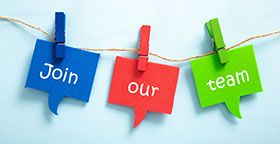 Blue, red, and green speech bubbles with text that reads
