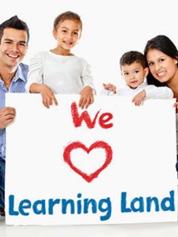Family holding a sign that says 