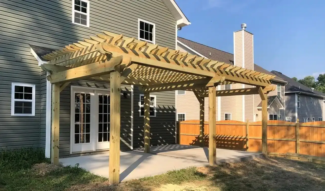 Custom wood pergola installation by Right At Home Construction LLC