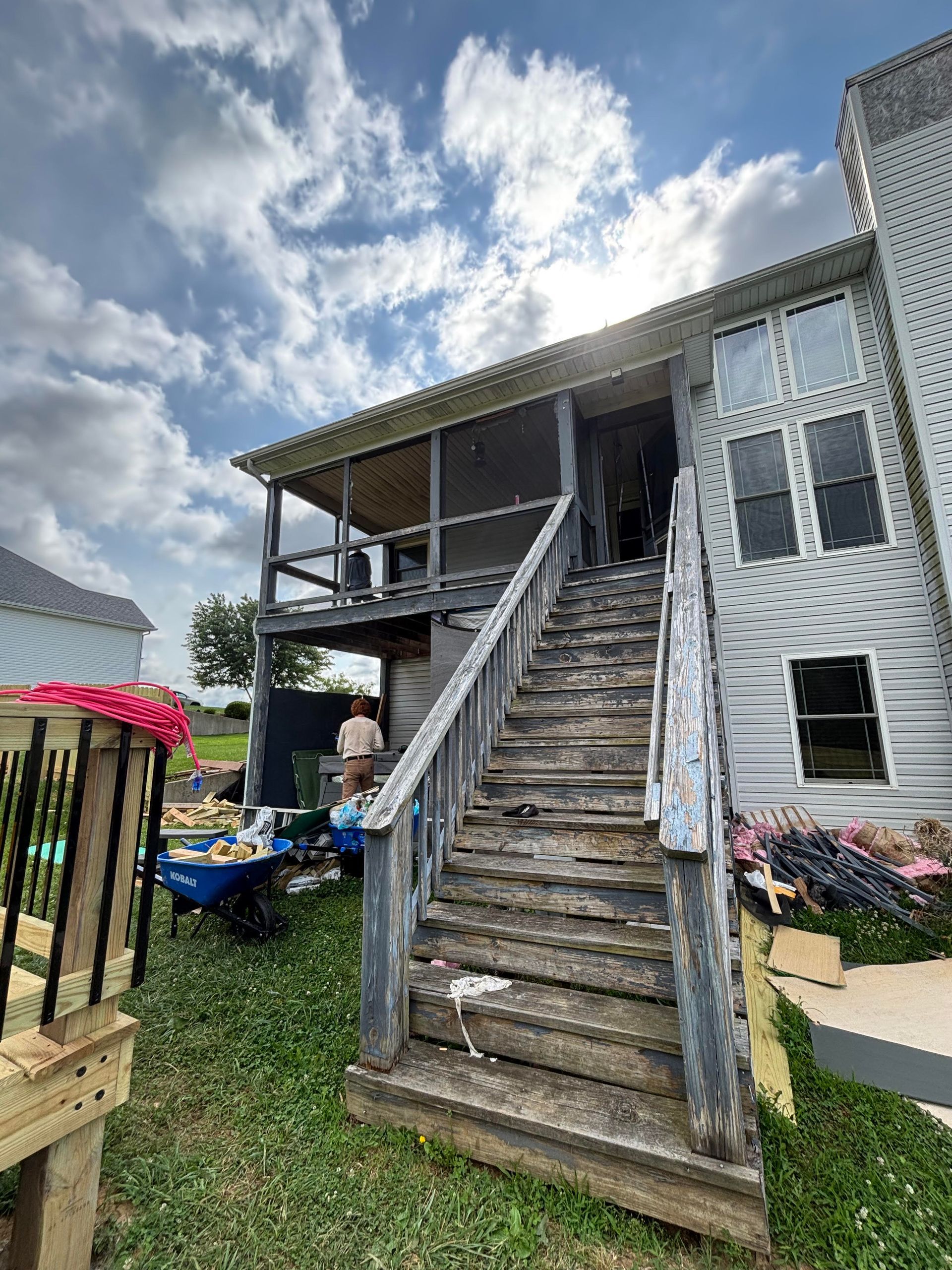 Before photo of existing deck prior to custom deck and patio room installation in Central Kentucky