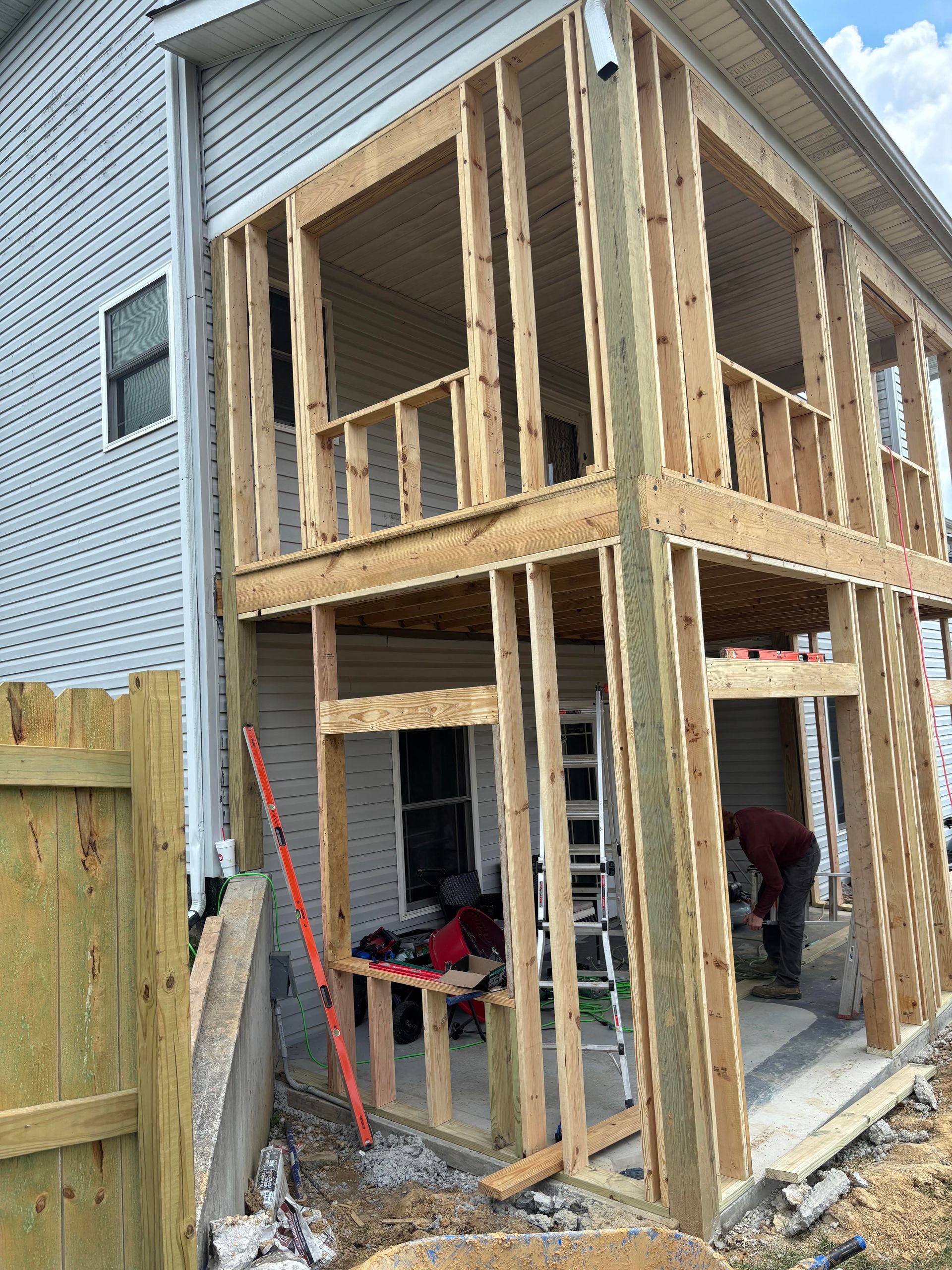 During Custom wood framed 3 season patio room with screened windows