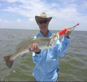 man holding fish