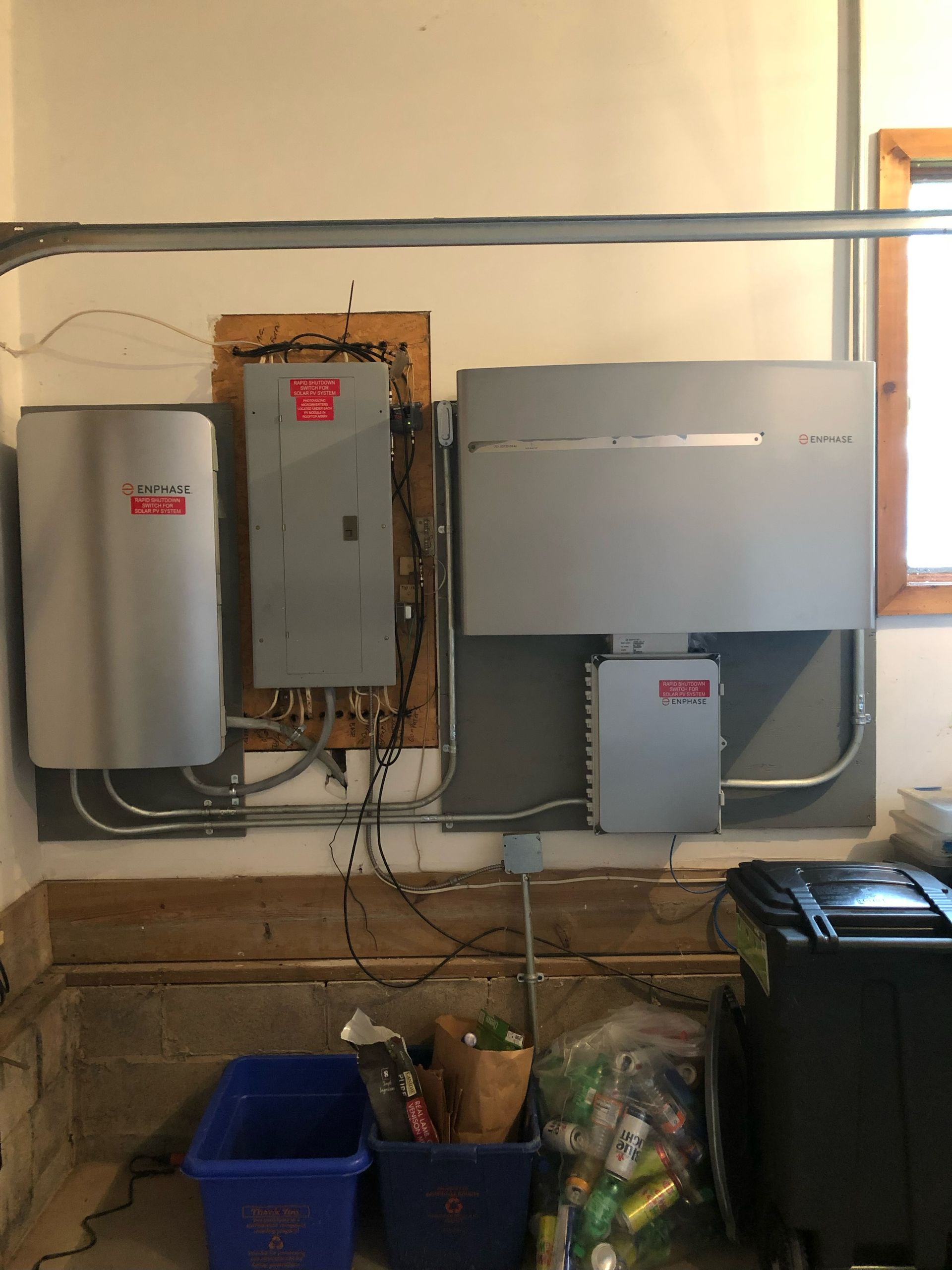 a room with a lot of electrical equipment on the wall 
