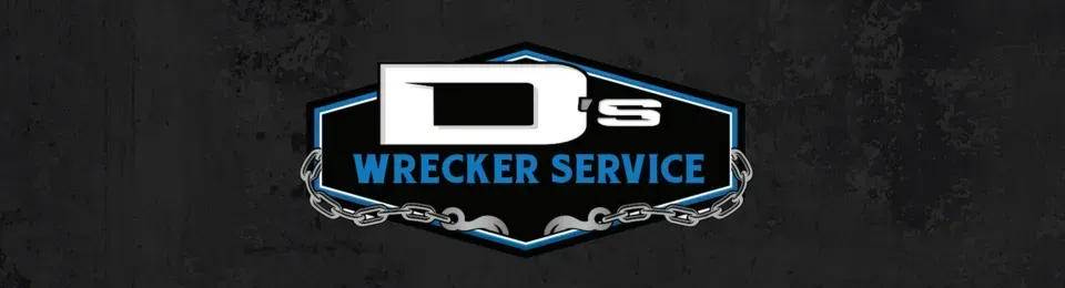 Logo for D’s Wrecker Service in white and blue on a dark background, with a tow hook graphic