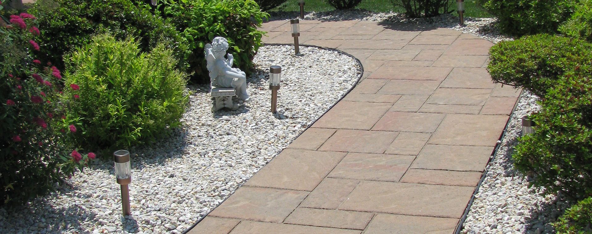 Garden With A Statue In The Middle — Columbus, NJ — G & G Landscaping Construction, Inc.