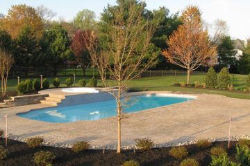 Swimming Pool Flanked By Trees — Columbus, NJ — G & G Landscaping Construction, Inc.