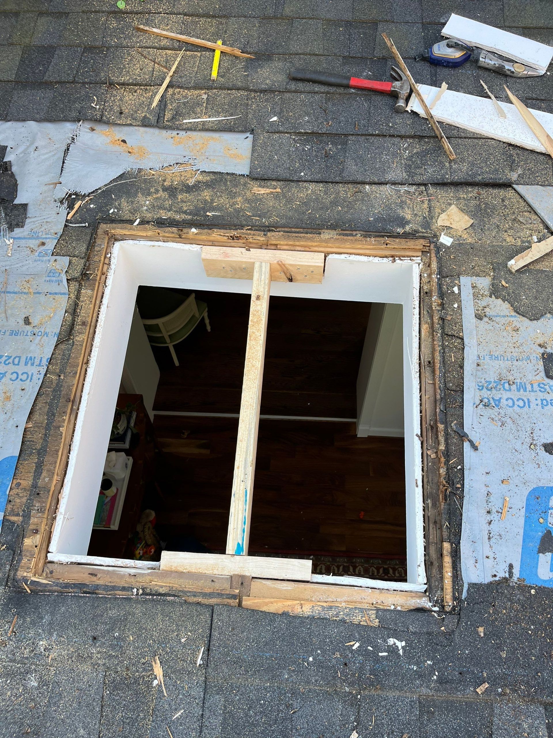 A during-project image of a RETEX skylight removal project in North Chesterfield VA 23236.