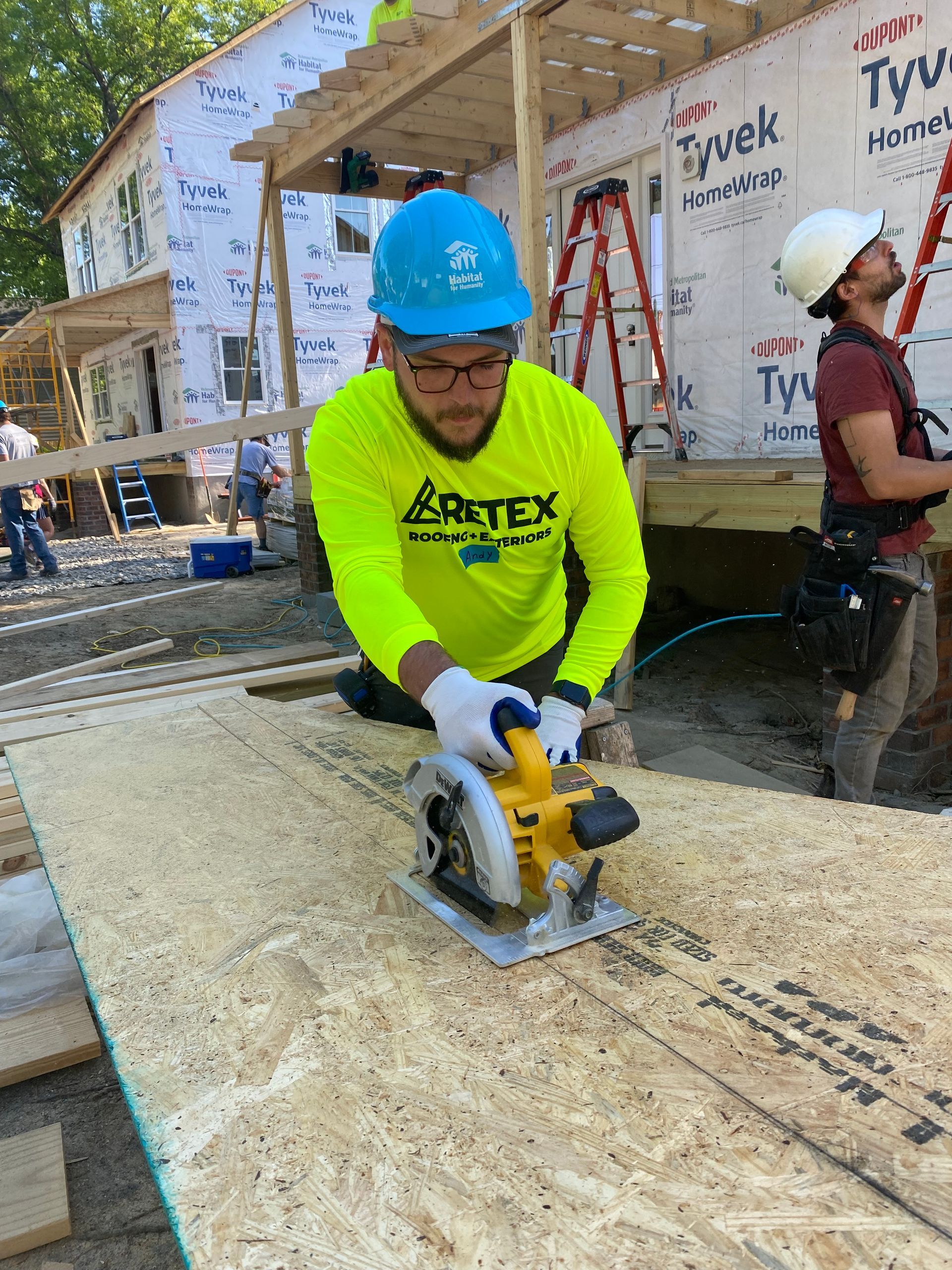 Image of RETEX’s Andy Connor volunteering with Richmond Habitat for Humanity in April 2023.