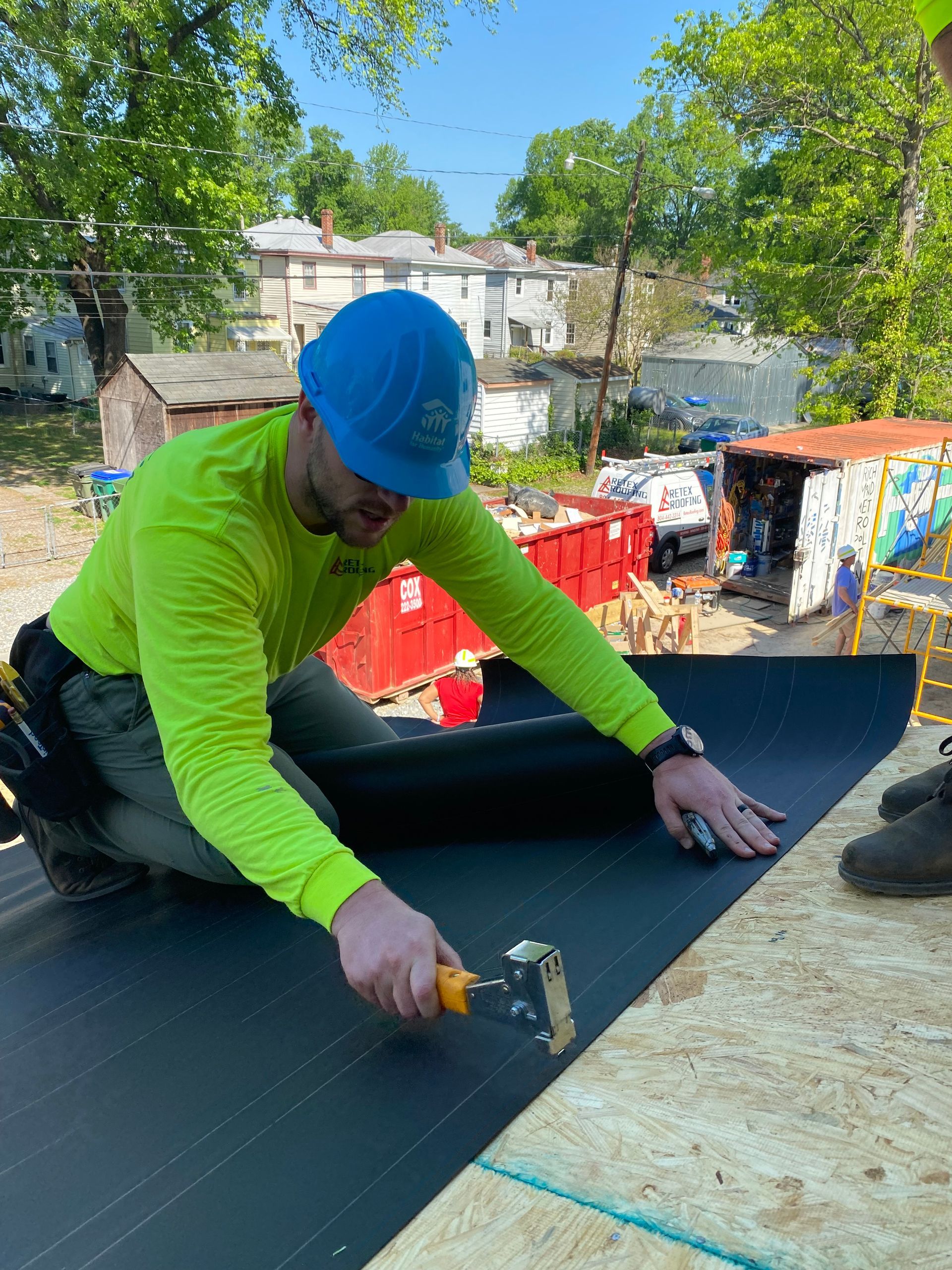 Image of RETEX’s Josh Lewis volunteering with Richmond Habitat for Humanity in April 2023.