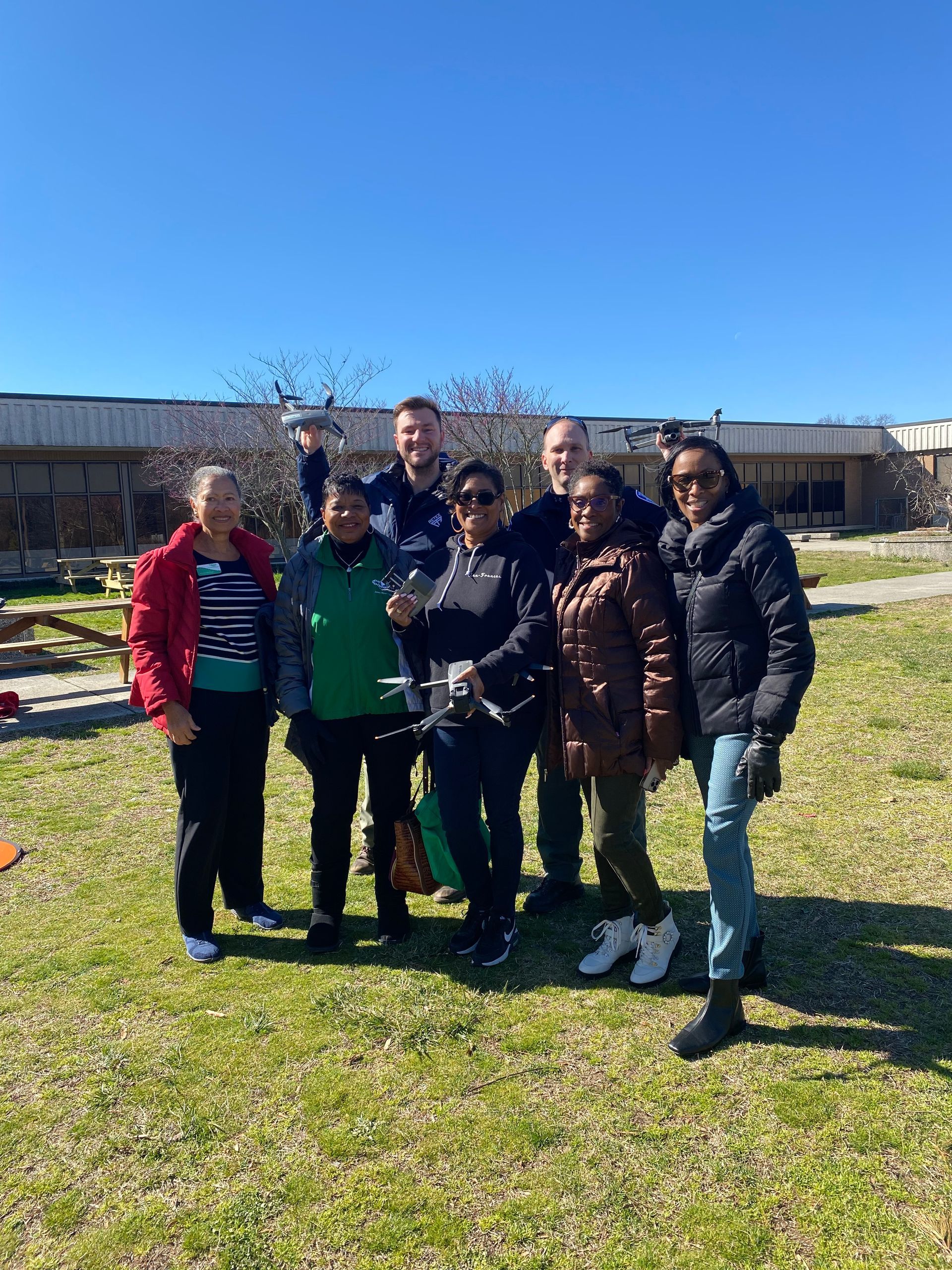Image of RETEX's Josh Lewis with other educators, from a class teaching 7th graders about drone flight rules.
