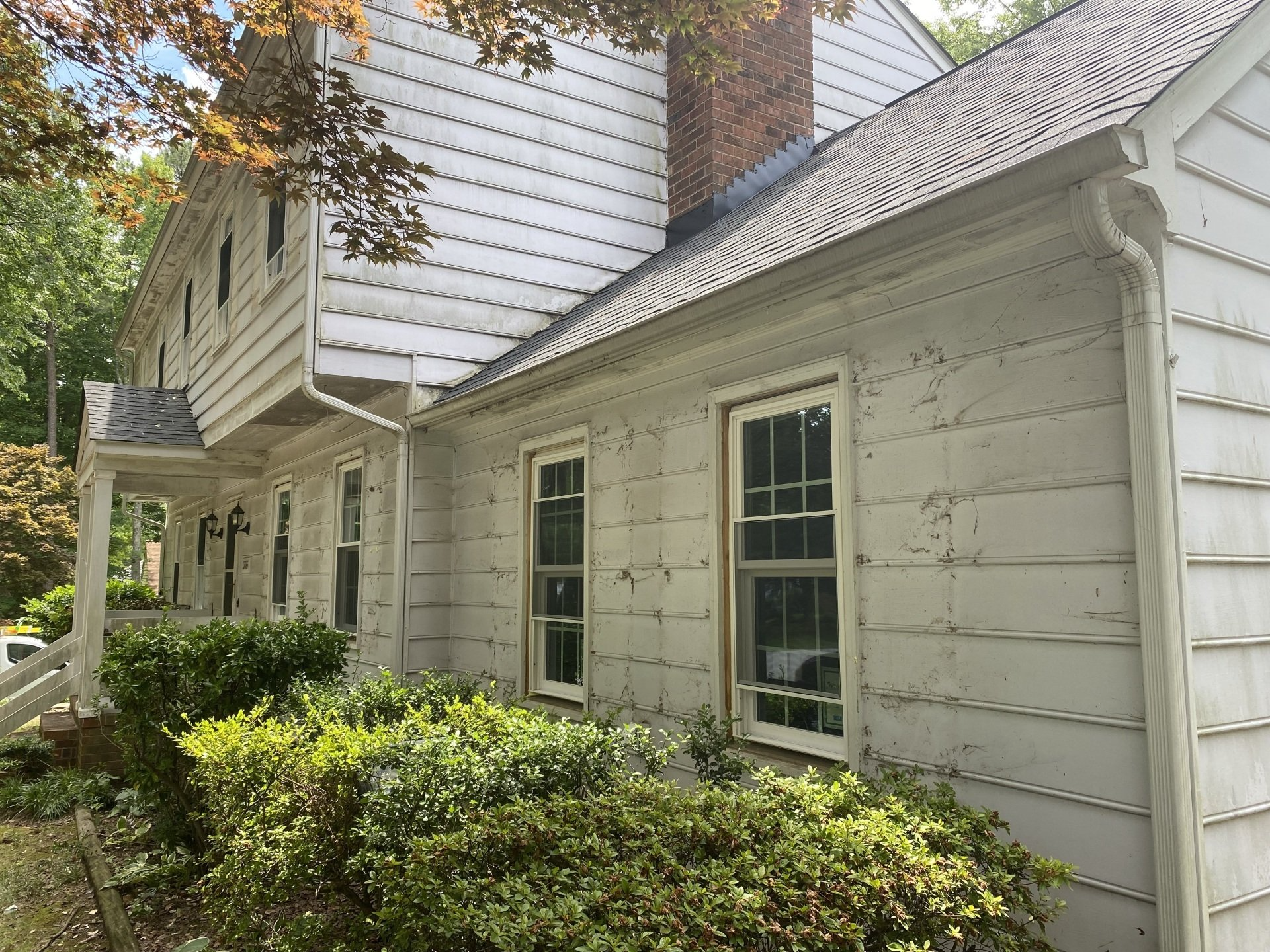 Image of front of home before RETEX replaced roof, siding, windows and gutters in North Chesterfield VA 23235. 