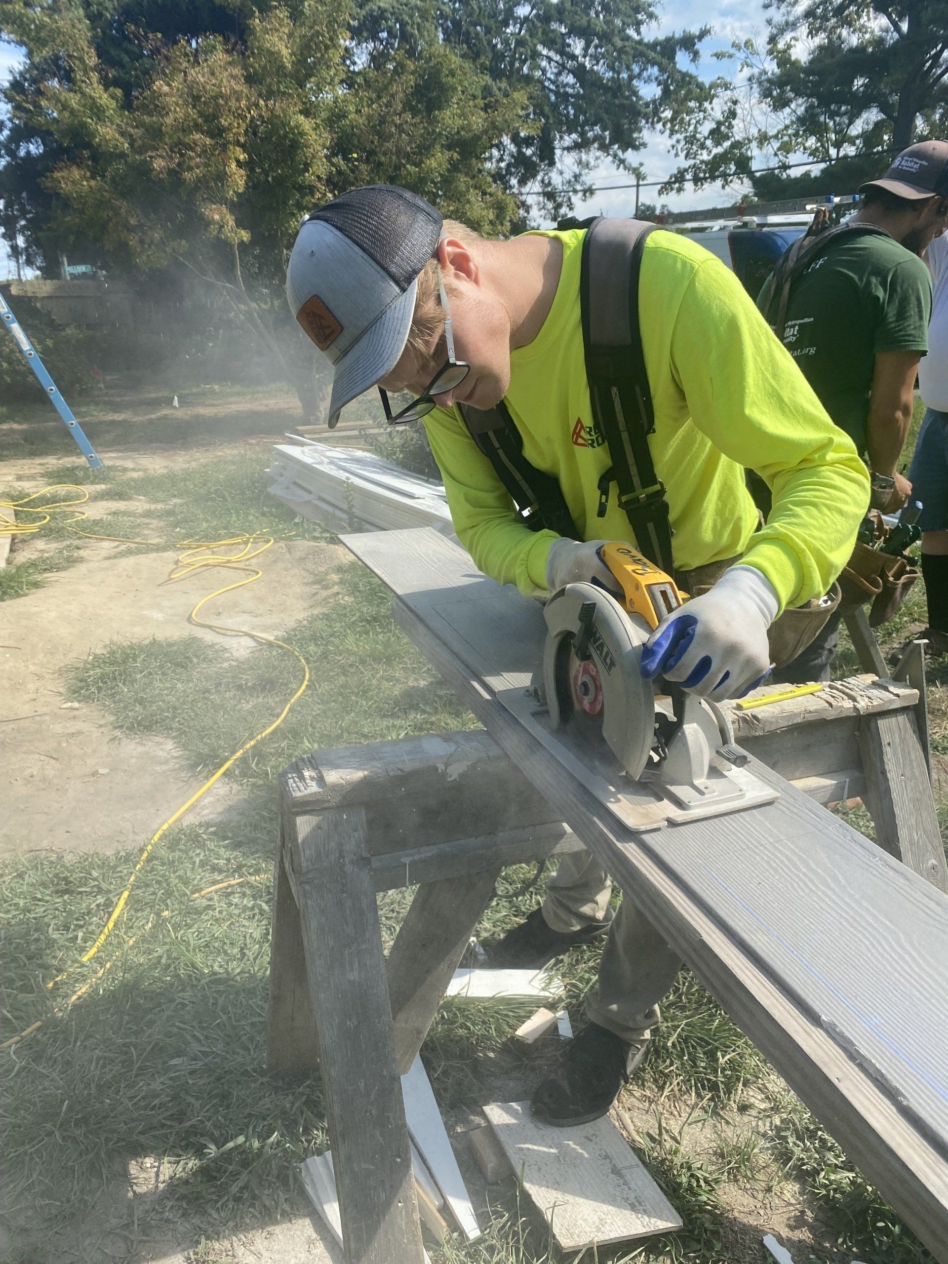 Image of RETEX’s Caleb Hennon volunteering with Richmond Habitat for Humanity in August 2022. 