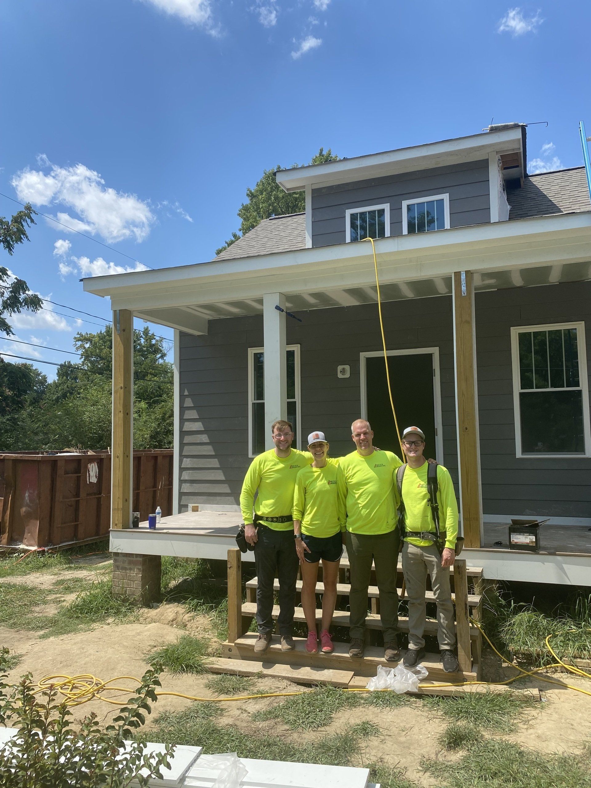 Image of RETEX’s  Josh & Katelyn Lewis, Mark Erickson, and Caleb Hennon volunteering with Richmond Habitat for Humanity. 