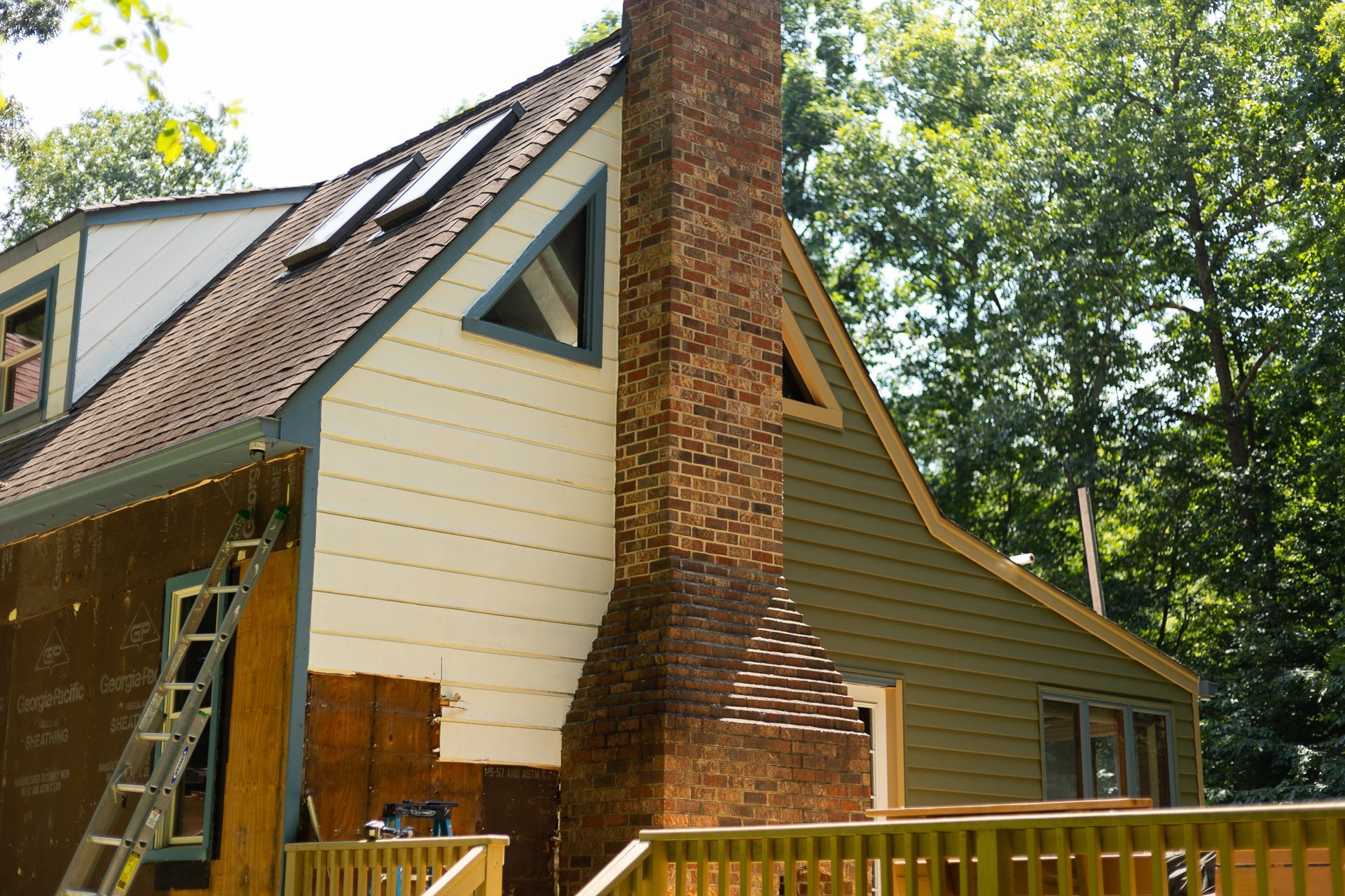 A during-install photo of a RETEX siding replacement in North Chesterfield VA 23235. Certainteed Cedarboard vinyl siding. 