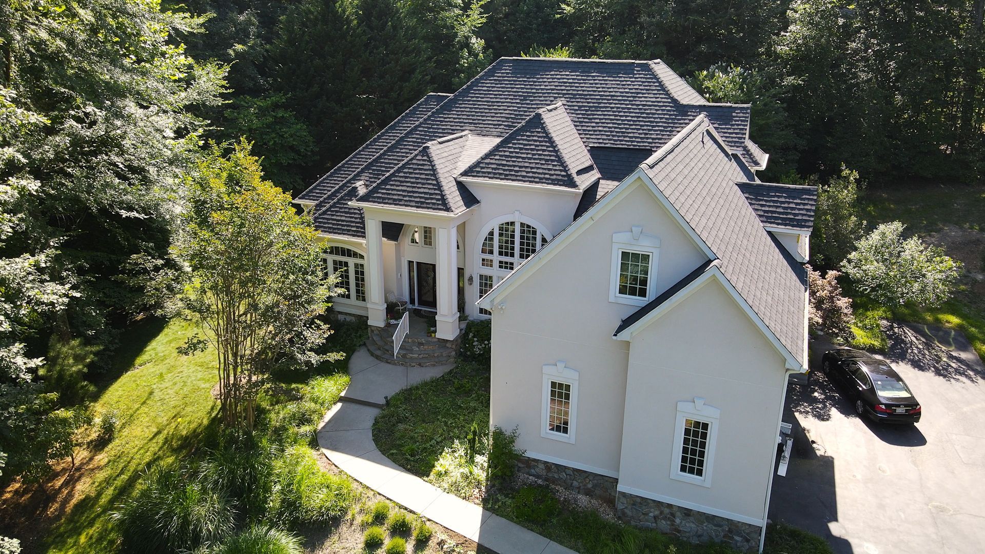 RETEX roof replacement in Midlothian VA with Certainteed Grand Manor Black Pearl shingles.