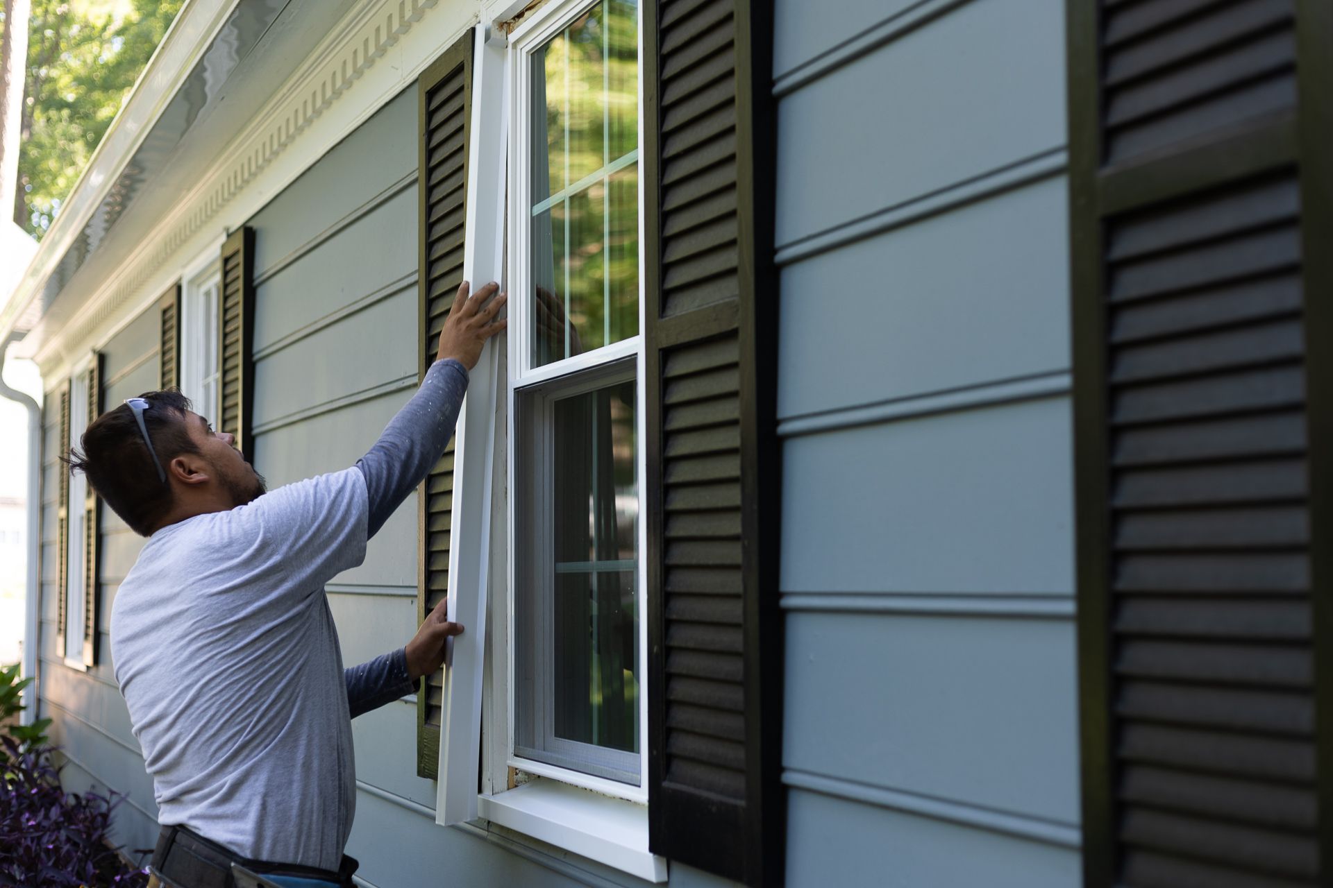 A during-installation image of a RETEX window replacement in North Chesterfield VA 23235.