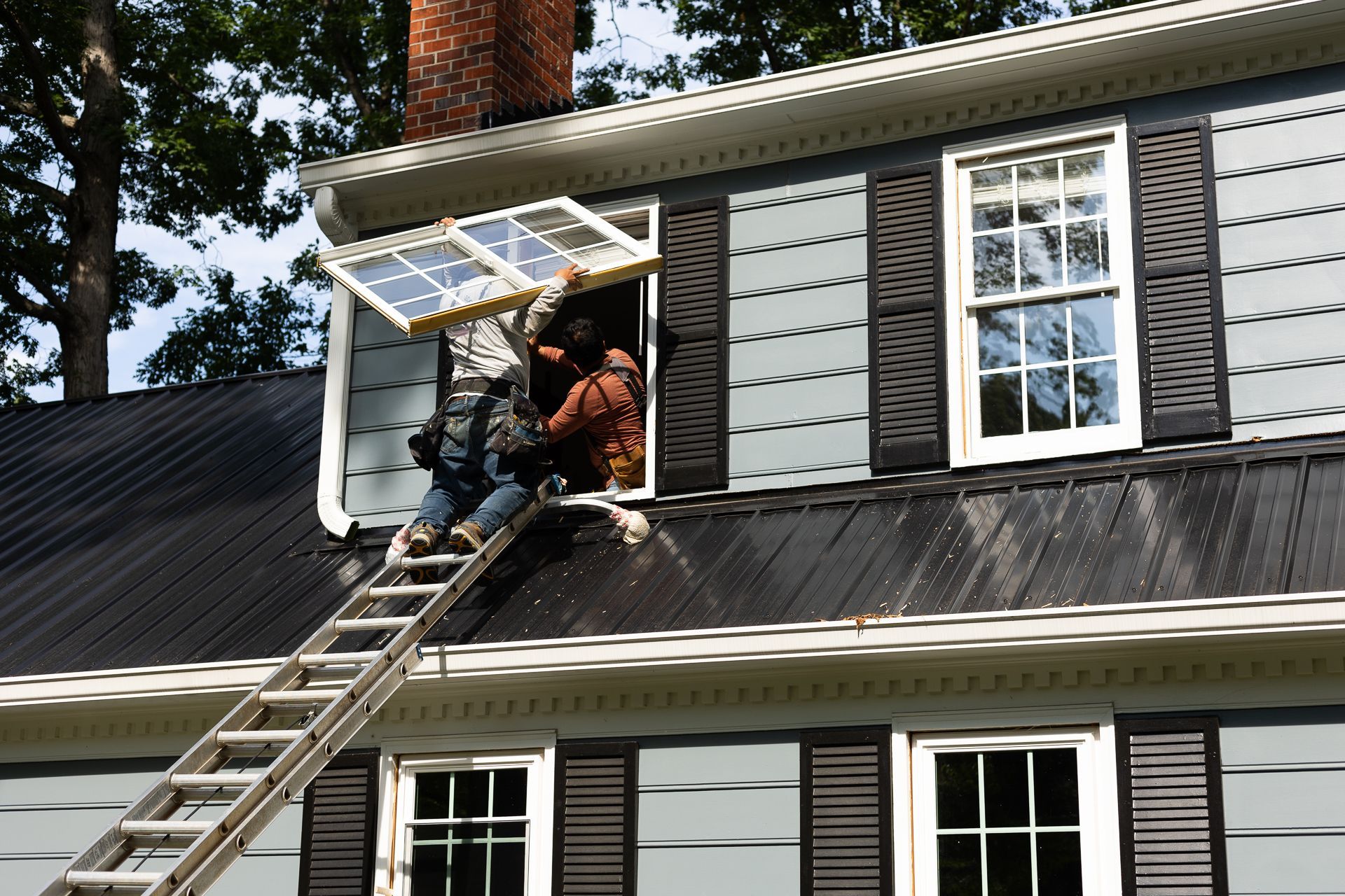 A during-installation image of a RETEX window replacement in North Chesterfield VA 23235.