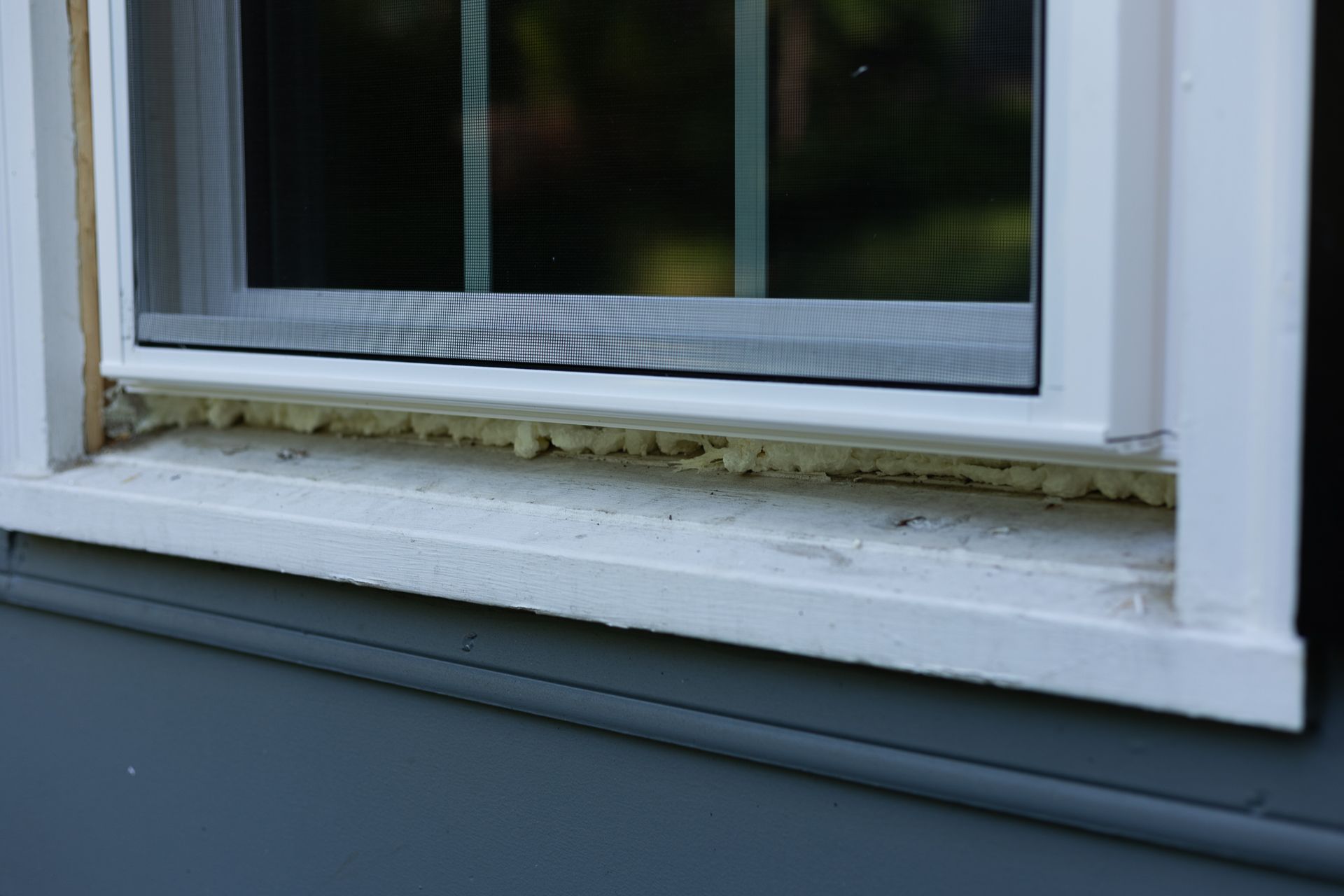 A during-installation image of a RETEX window replacement in North Chesterfield VA 23235.