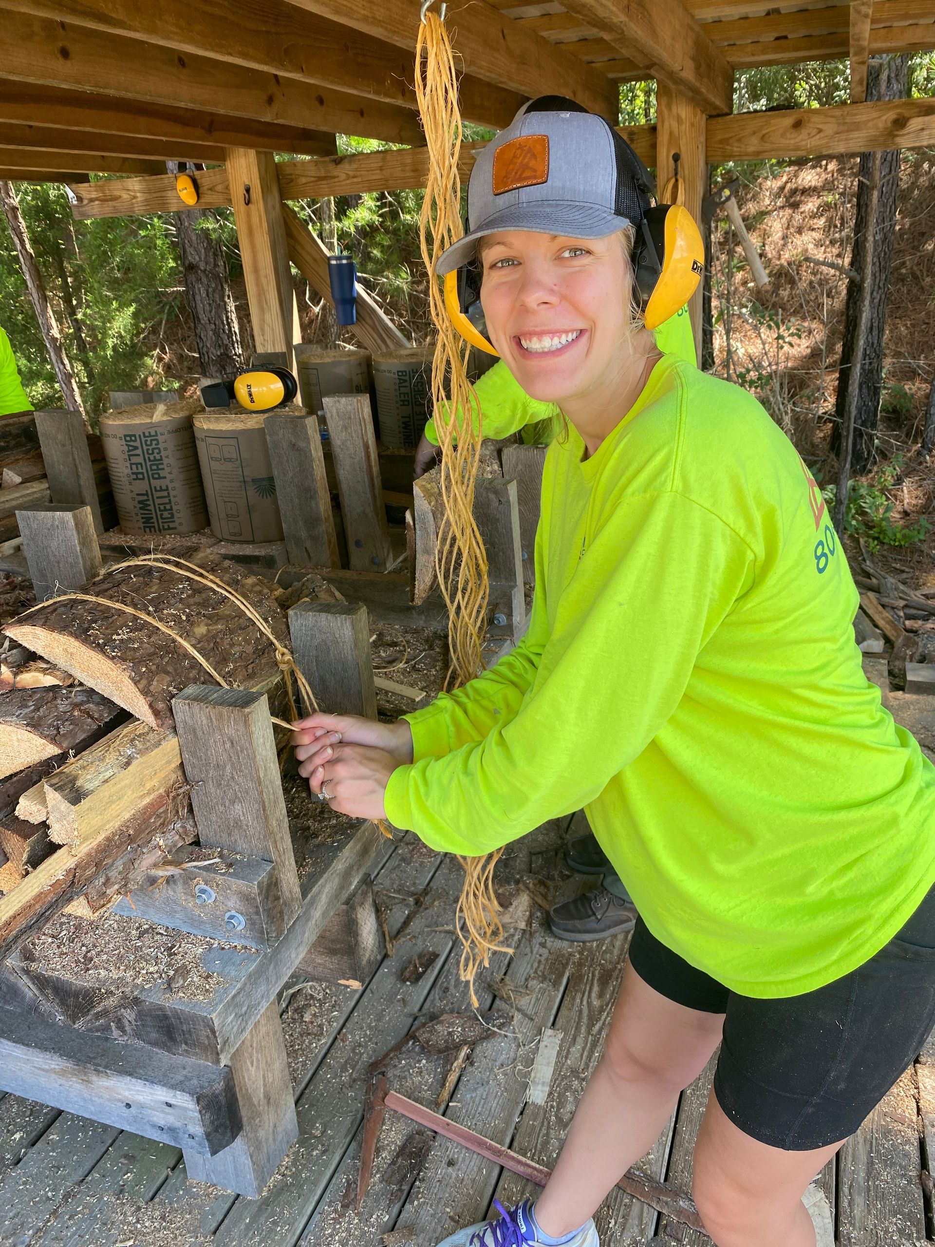 Image of RETEX's Katelyn Lewis volunteering with MENO Life in July 2023.
