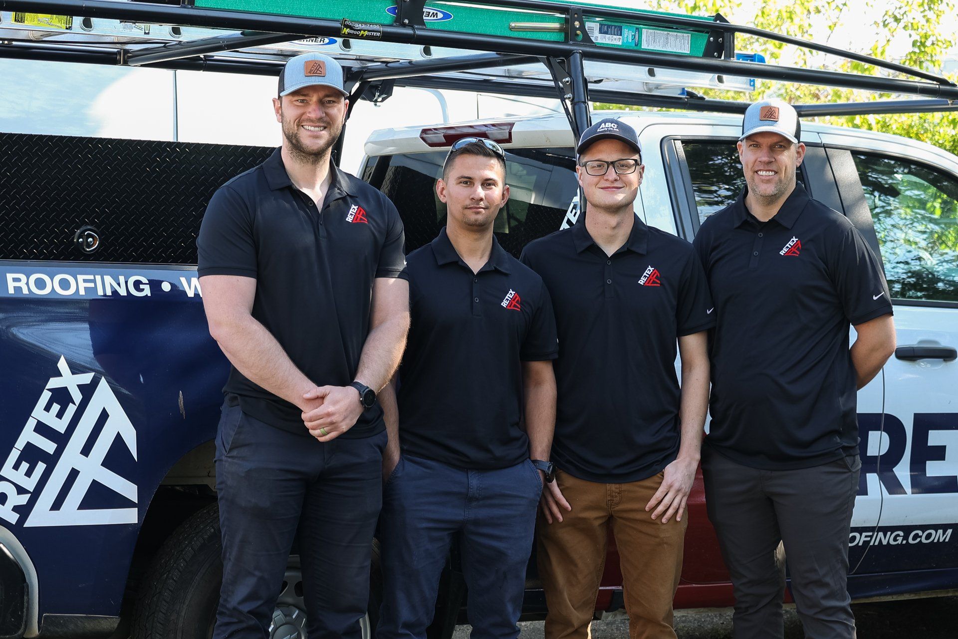 Portrait image of RETEX's Josh Lewis, Caleb Kammerling, Caleb Hennon, and Mark Erickson.
