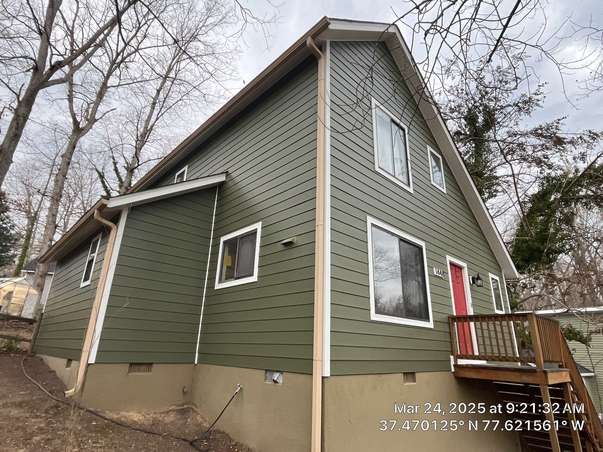A during-installation photo of RETEX installing CertainTeed Cedarboard siding on a North Chesterfield VA home.