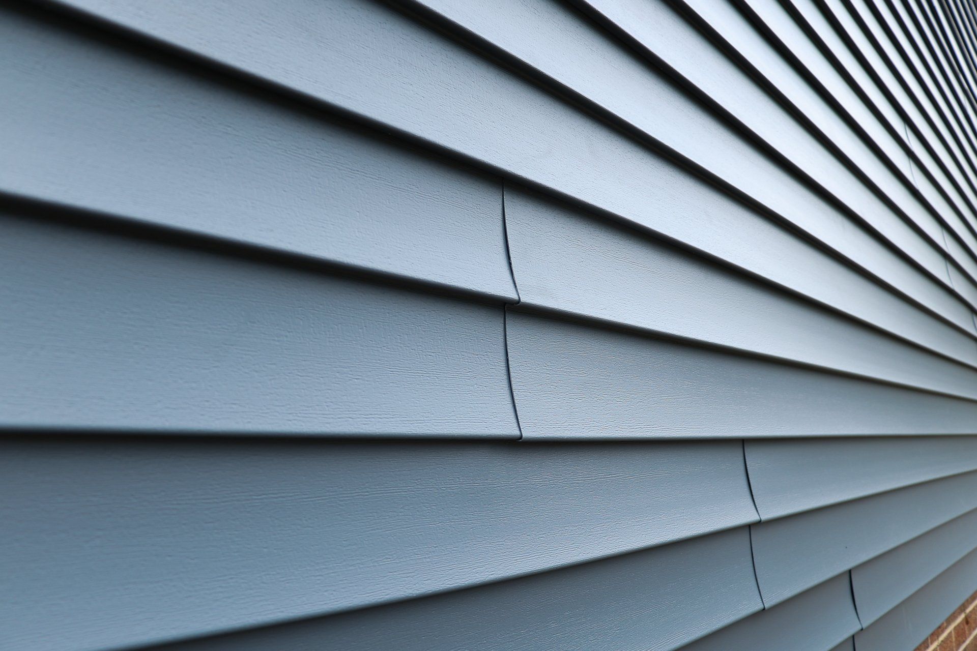 A close-up image of a new vinyl siding on a North Chesterfield VA home, installed by RETEX.