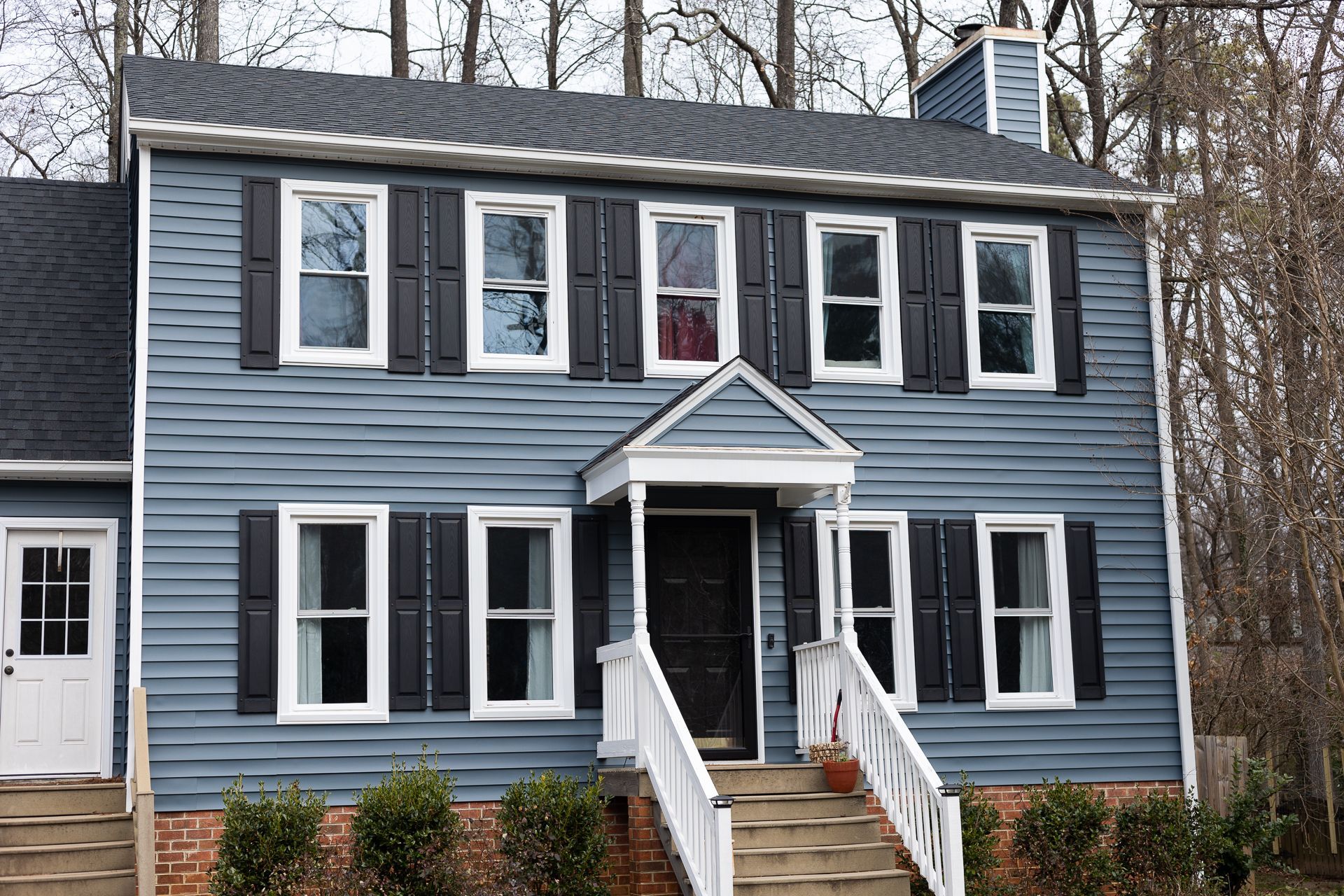 Retex replaced the siding on this home in Bon Air, VA with vinyl in 2022.