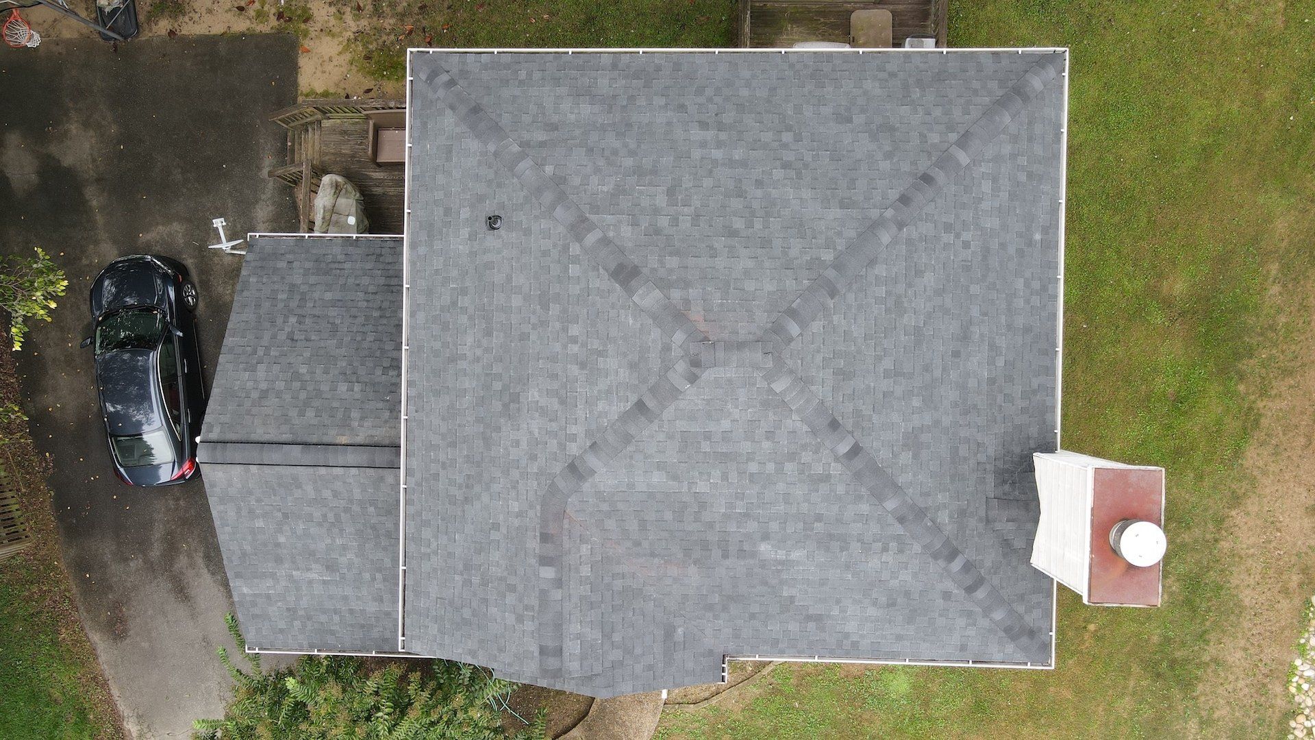 Image of RETEX roof replacement in Midlothian VA 23112.  Tamko Heritage Rustic Black architectural asphalt shingles.