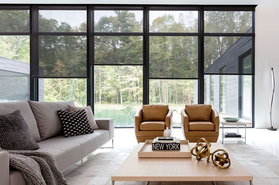 Black Norman® Solar Shades in Living Room,