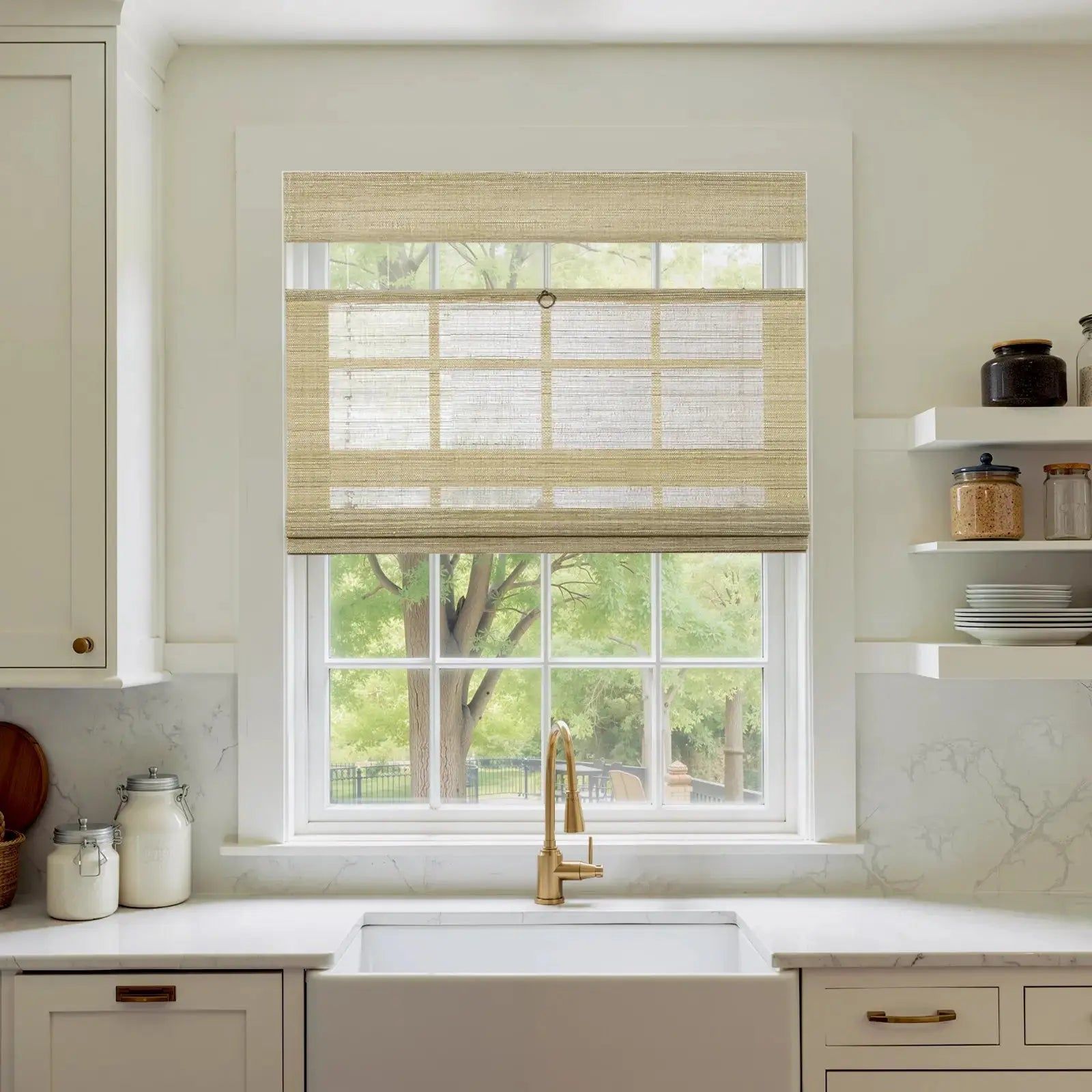 Top-down bottom-up woven wood shade above sink in kitchen.
